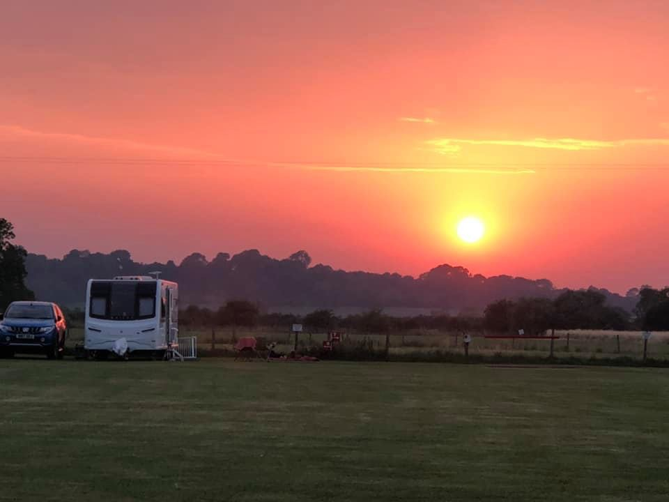 Car and caravan in the sunset