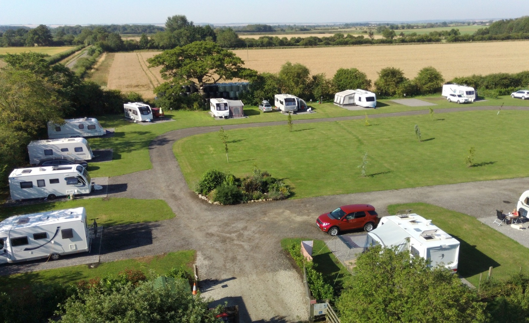View over caravan park with caravans on the pitches